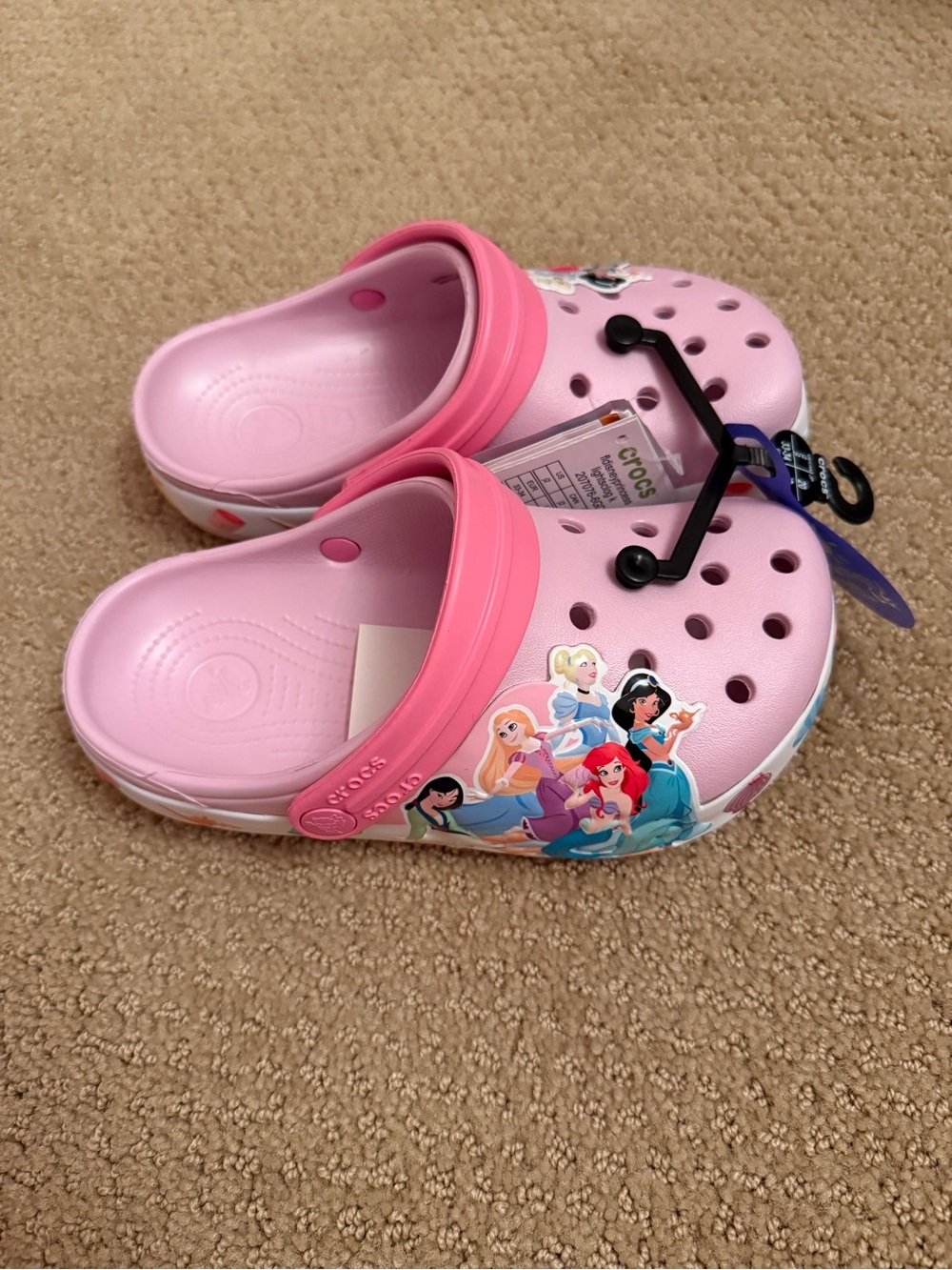 NWT. Crocs Disney Princess light up clogs. Size J2